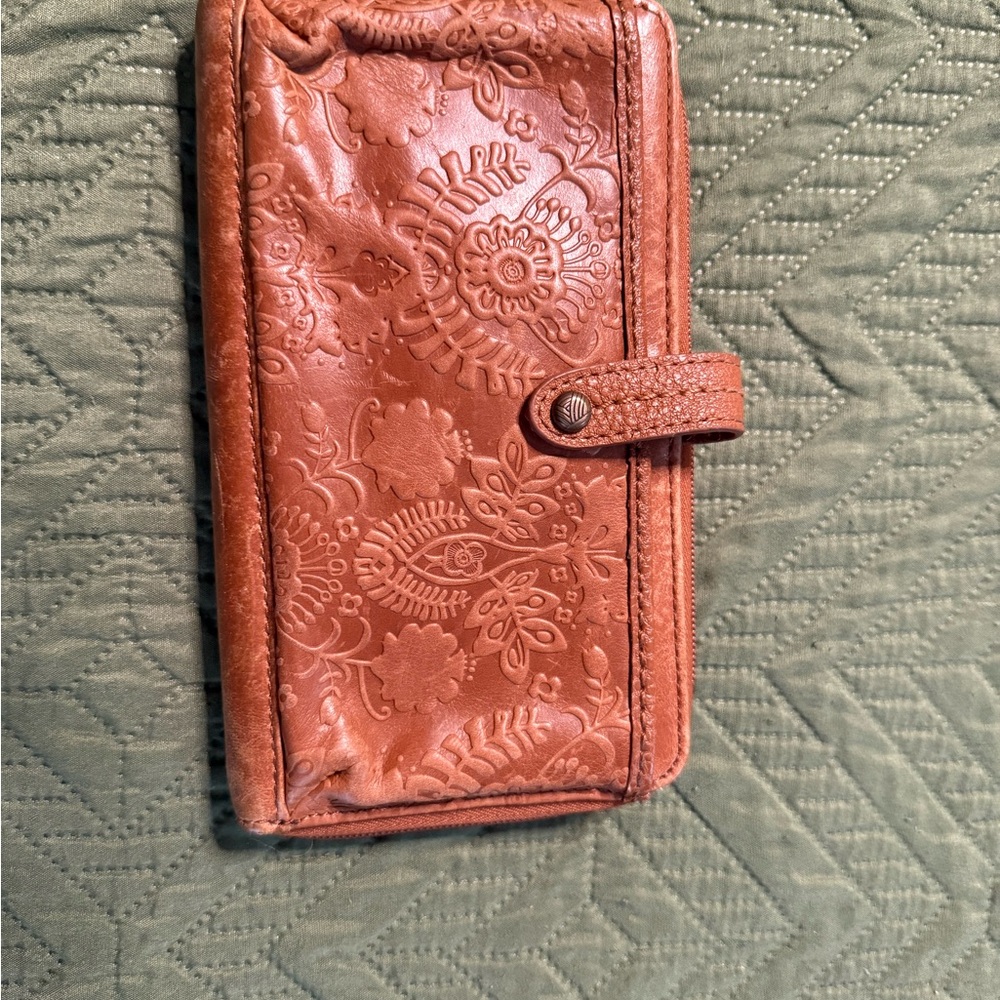 The Sak Iris wallet in a Tobacco floral embossed leather